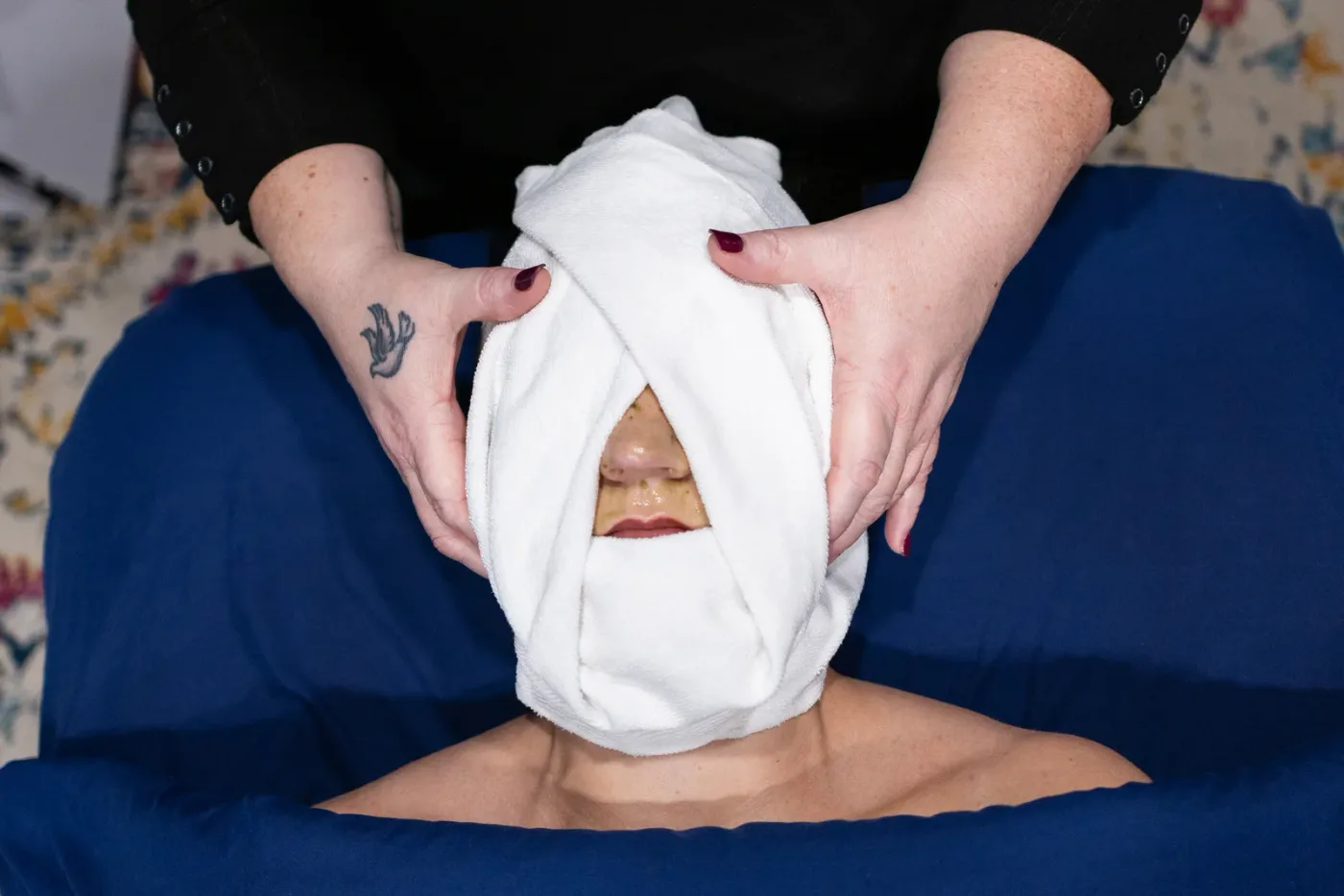 A hot towel wrap during a custom facial at Evolution of Beauty in Marshall, Minnesota
